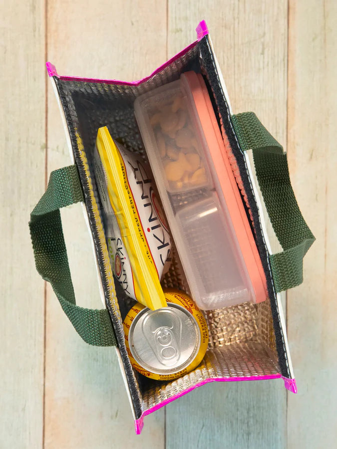 Small bag with items including a yellow pen, can, and small container on a wooden surface