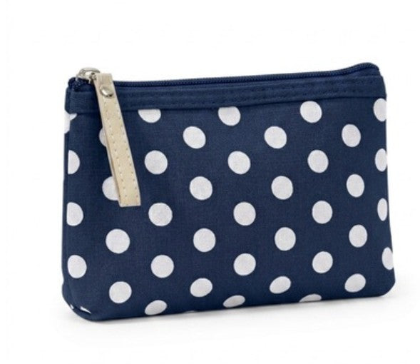 Navy blue pouch with white polka dots on a white background