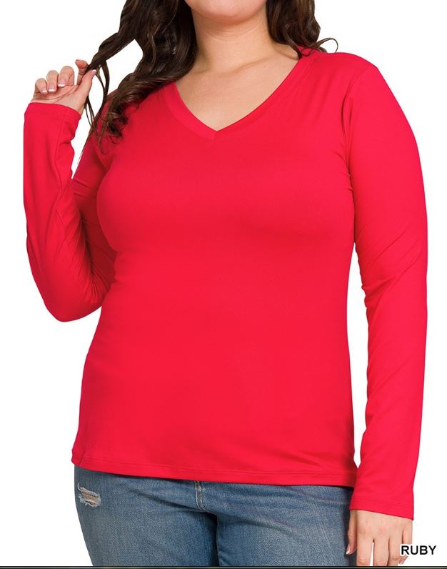 red v-neck long sleeve top on a model with a white background