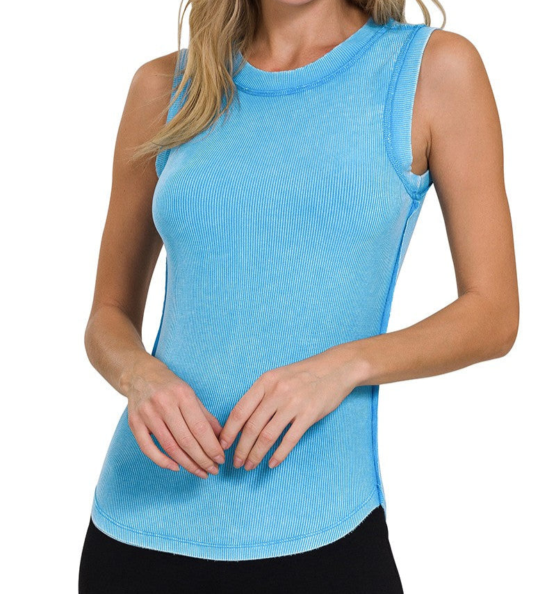A woman wearing a sky blue ribbed scoop neck tank top.