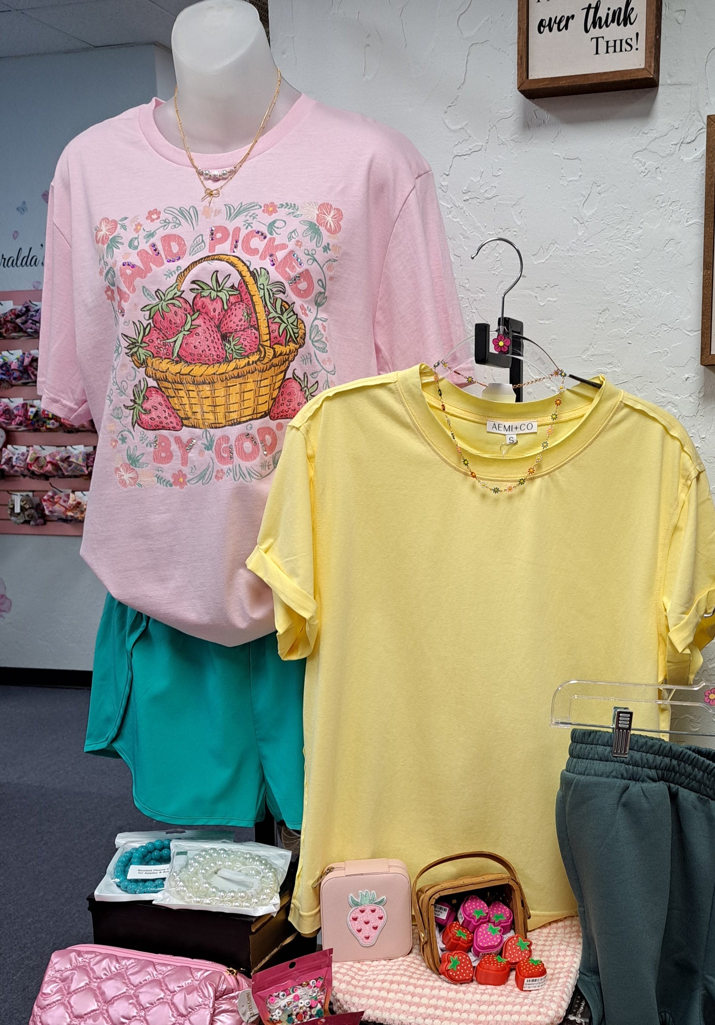 Strawberry and Yellow Top, Front. Display table at a store