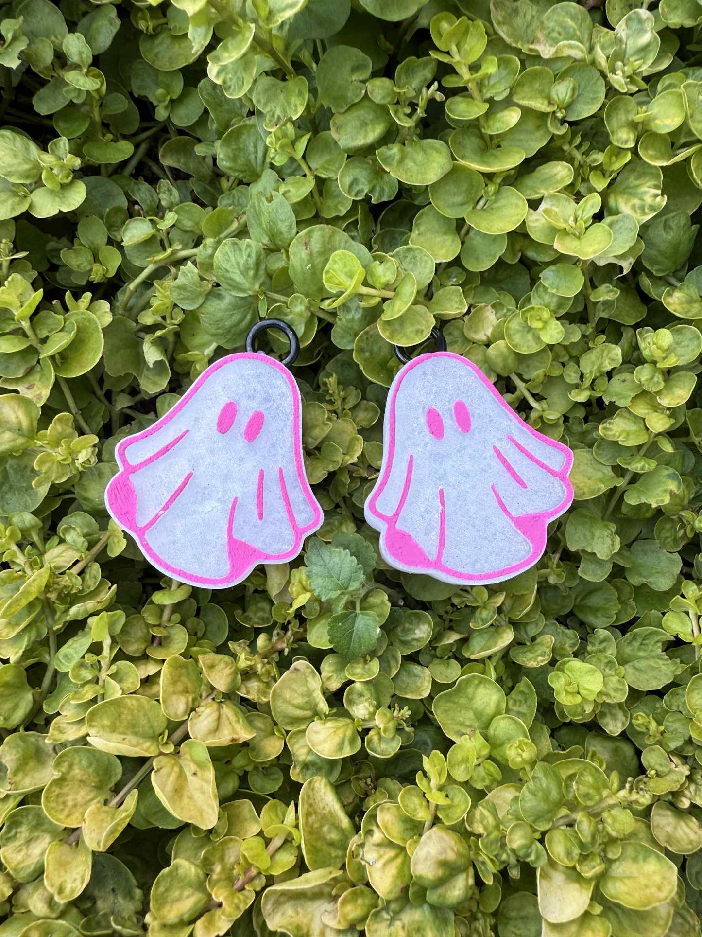 white ghost vent clip air fresheners on greenery background