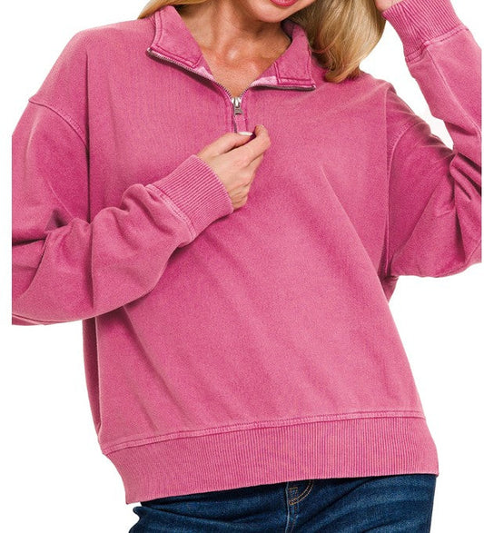 raspberry wine-colored quarter zip top on a woman with a white background