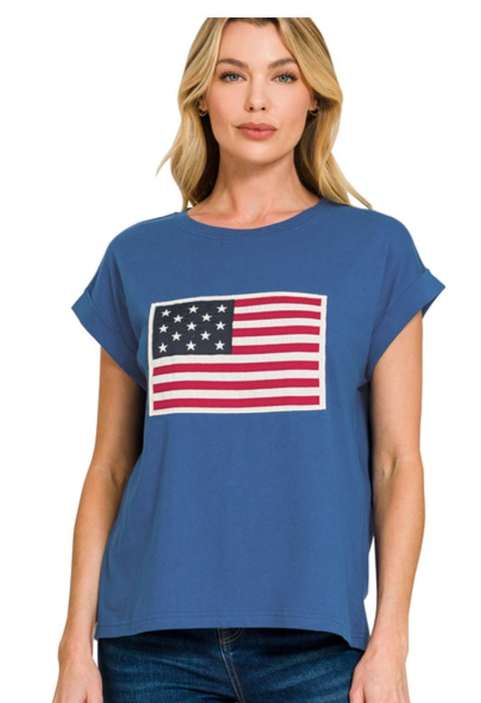 Woman wearing a blue t-shirt with an American flag design on a white background
