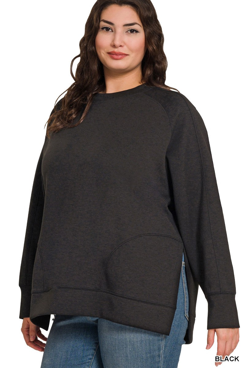Woman wearing a black sweatshirt on a white background