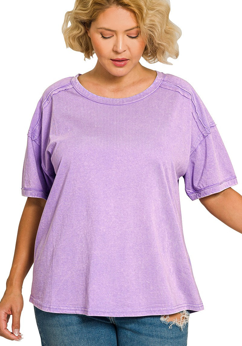 Woman wearing a lavender top on a white background