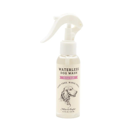 Waterless dog wash bottle with orchid musk scent on a white background