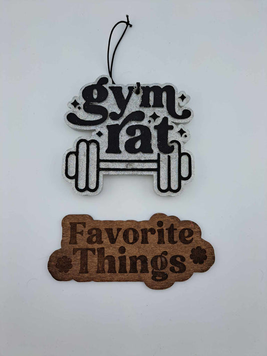 gym rat silver and black freshie on white background