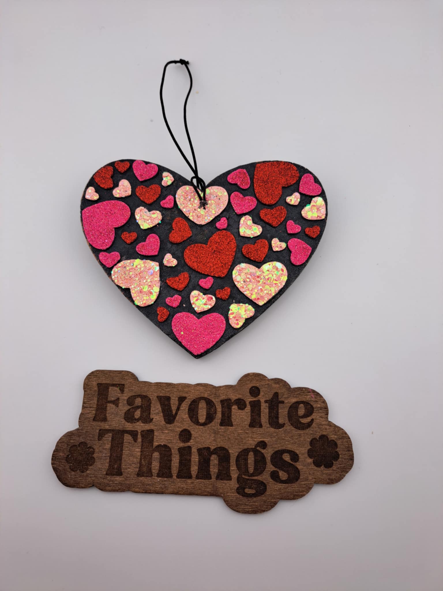 heart freshie with colorful hearts inside. white background. sign below says favorite things