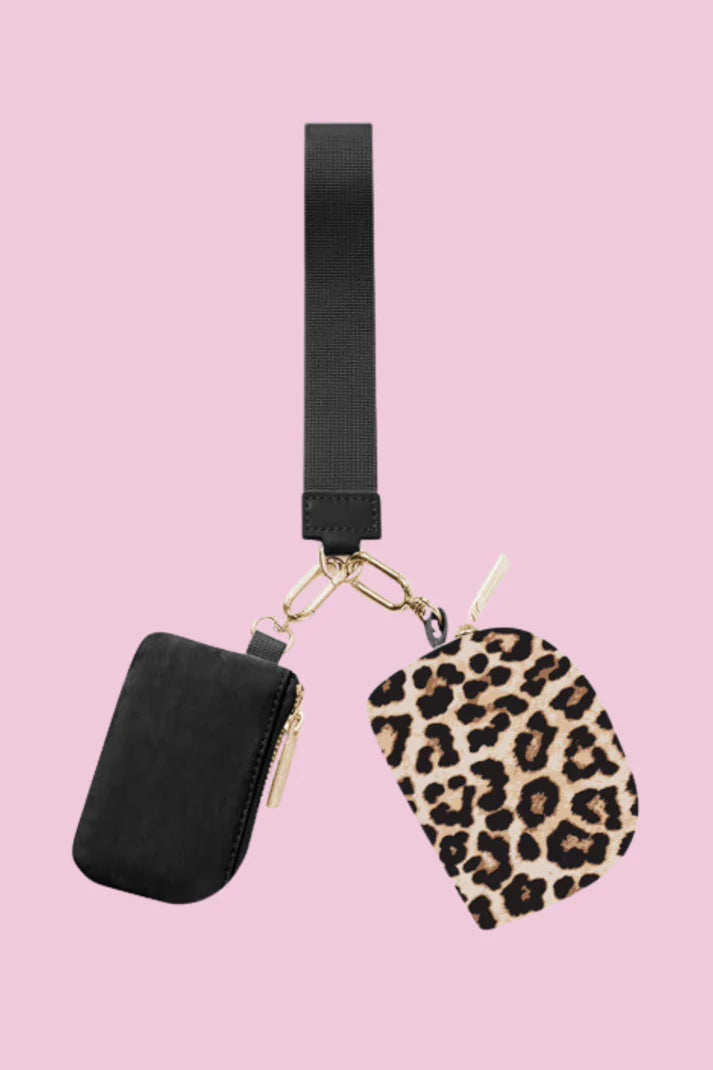 Black pouch and leopard print pouch on a pink backround