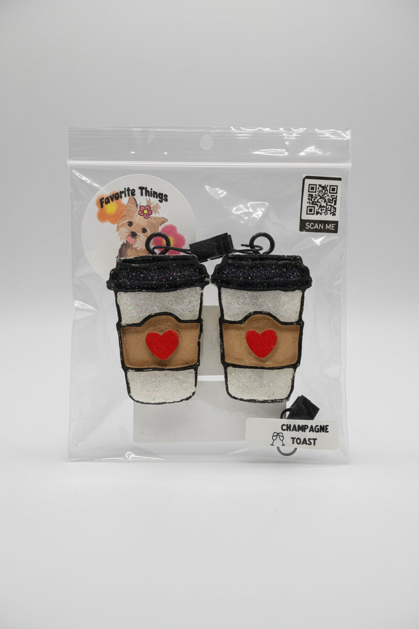 mug shaped air fresheners in clear bag againsta a neutral background