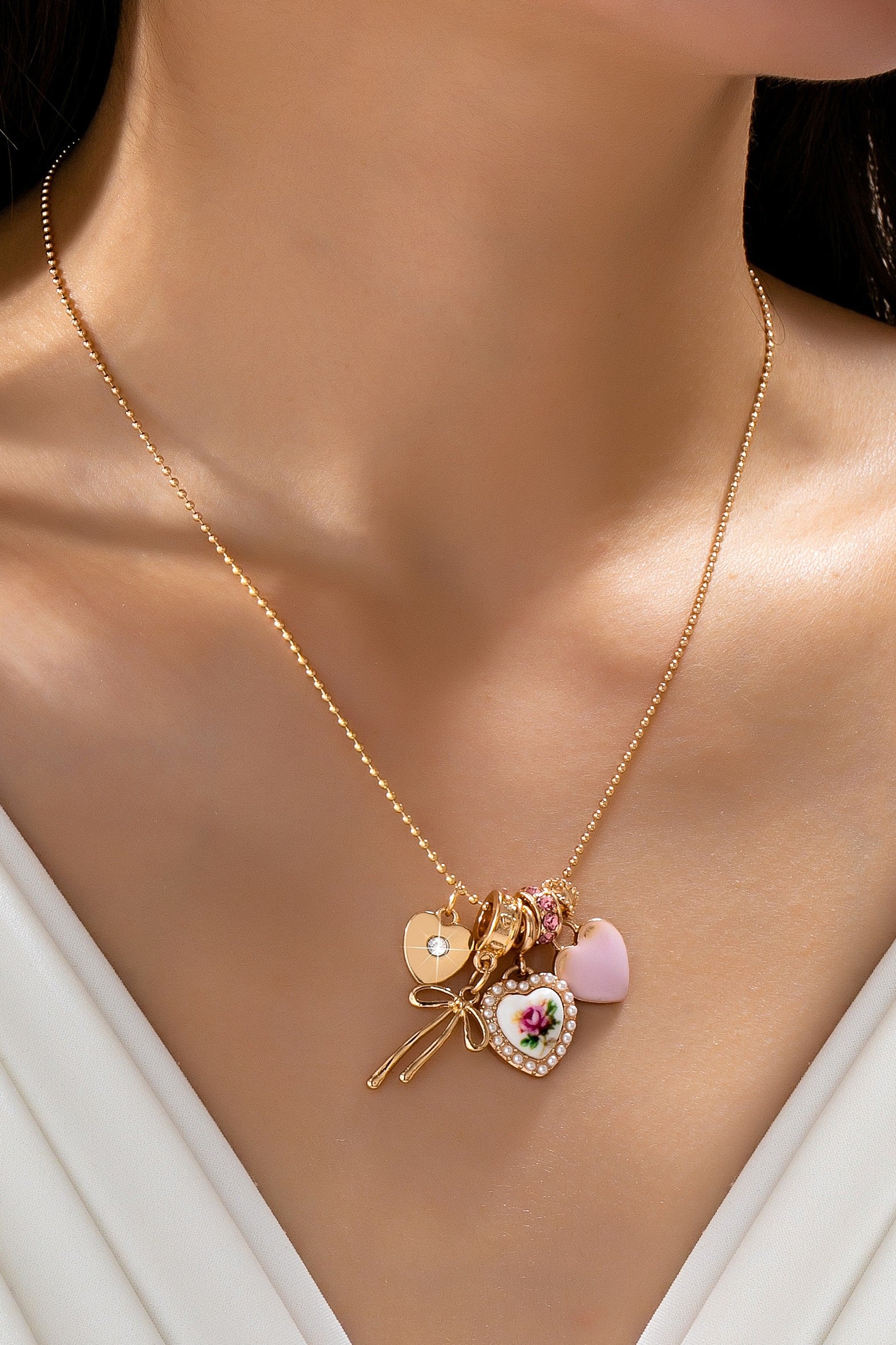 ball chain necklace with floral heart charm