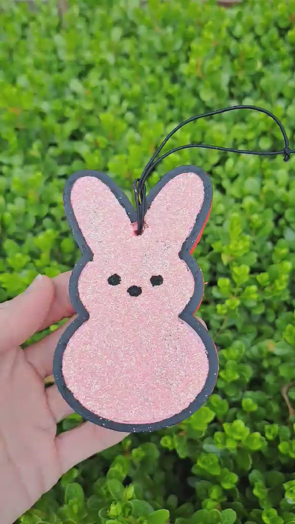 pink bunny freshie hel in hand