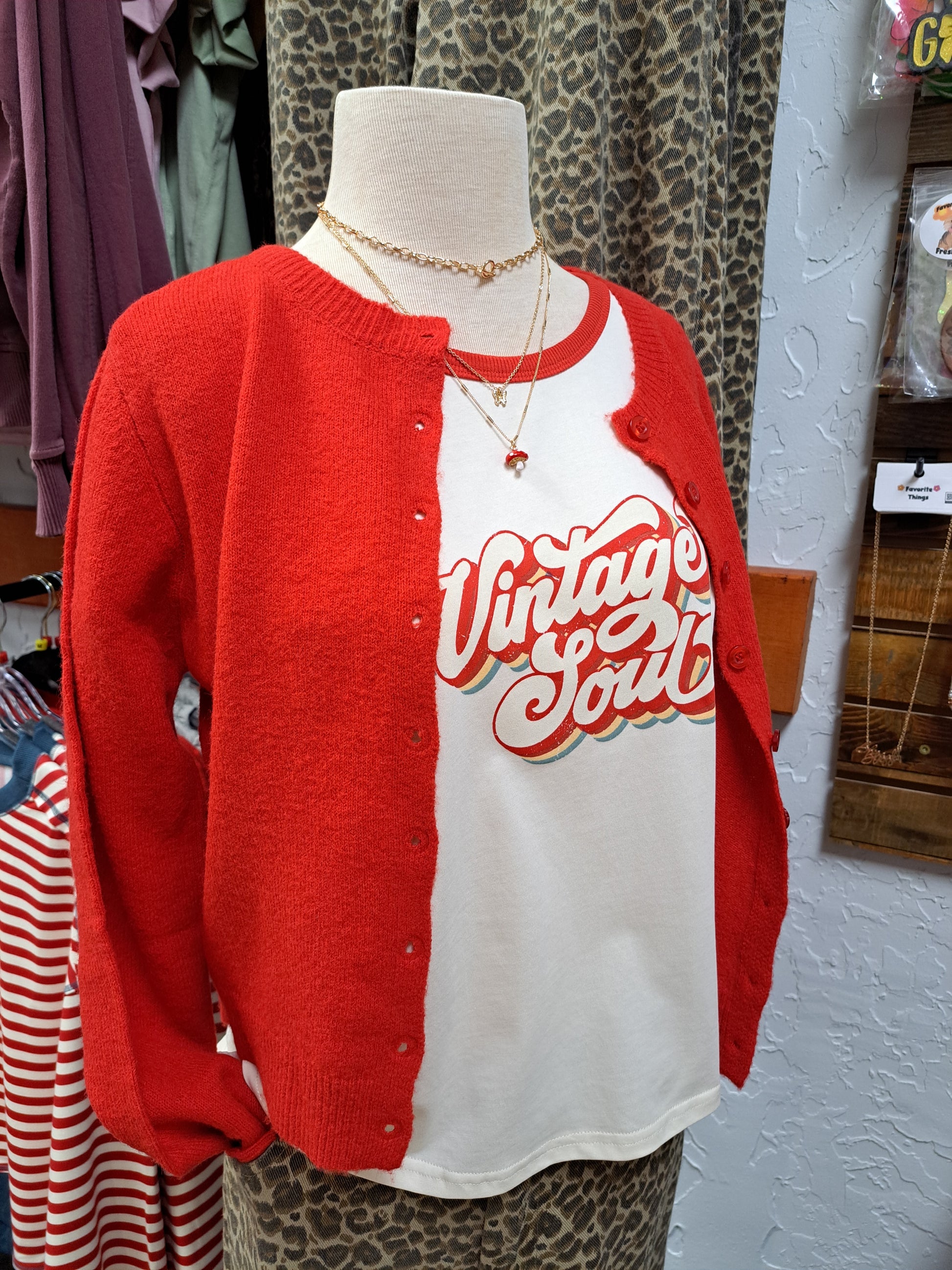 vintage soul tee on mannequin with red cardigan store display