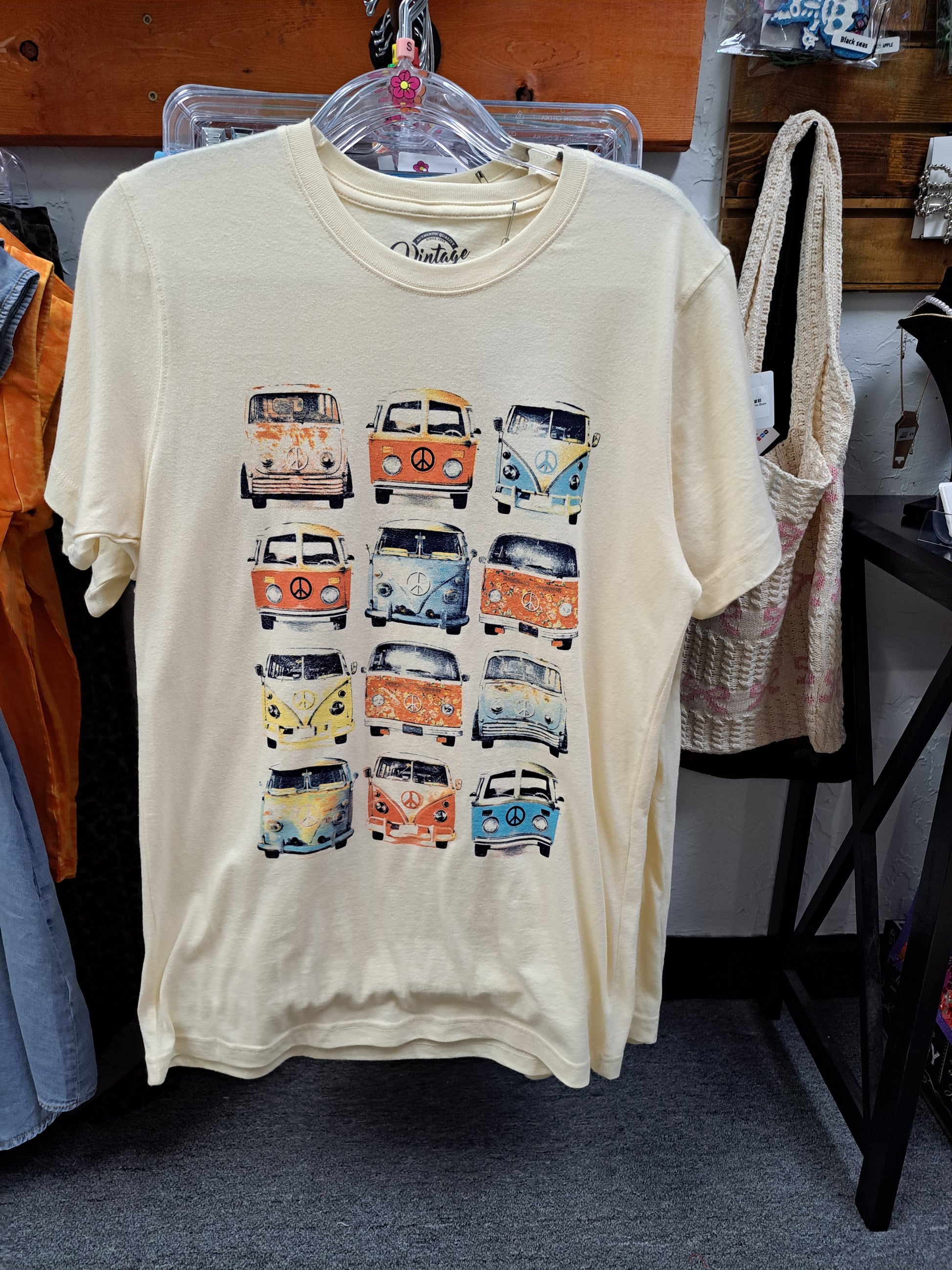cream retro van tee in a store