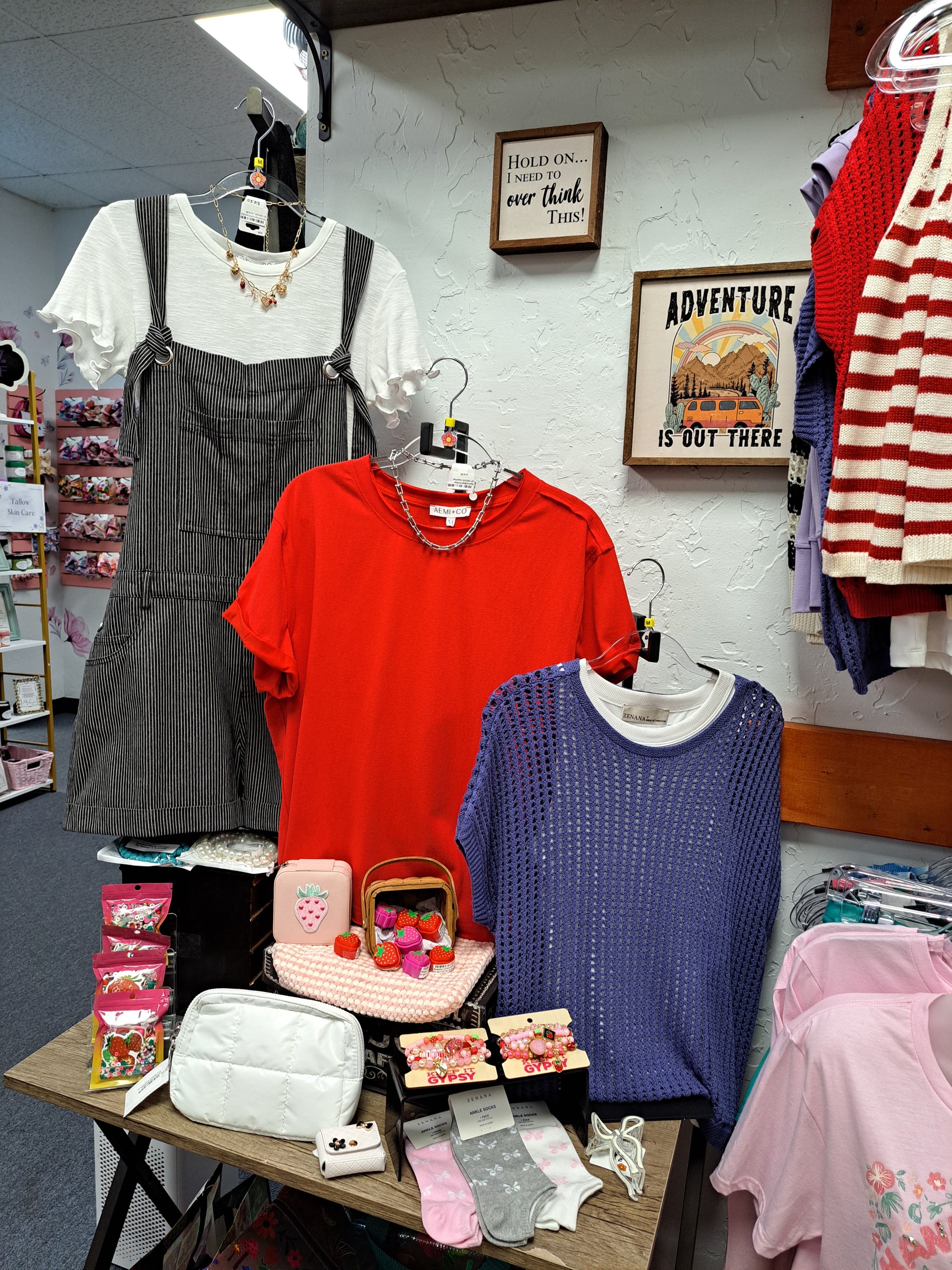 Top-down view of a clothing store with various items on display