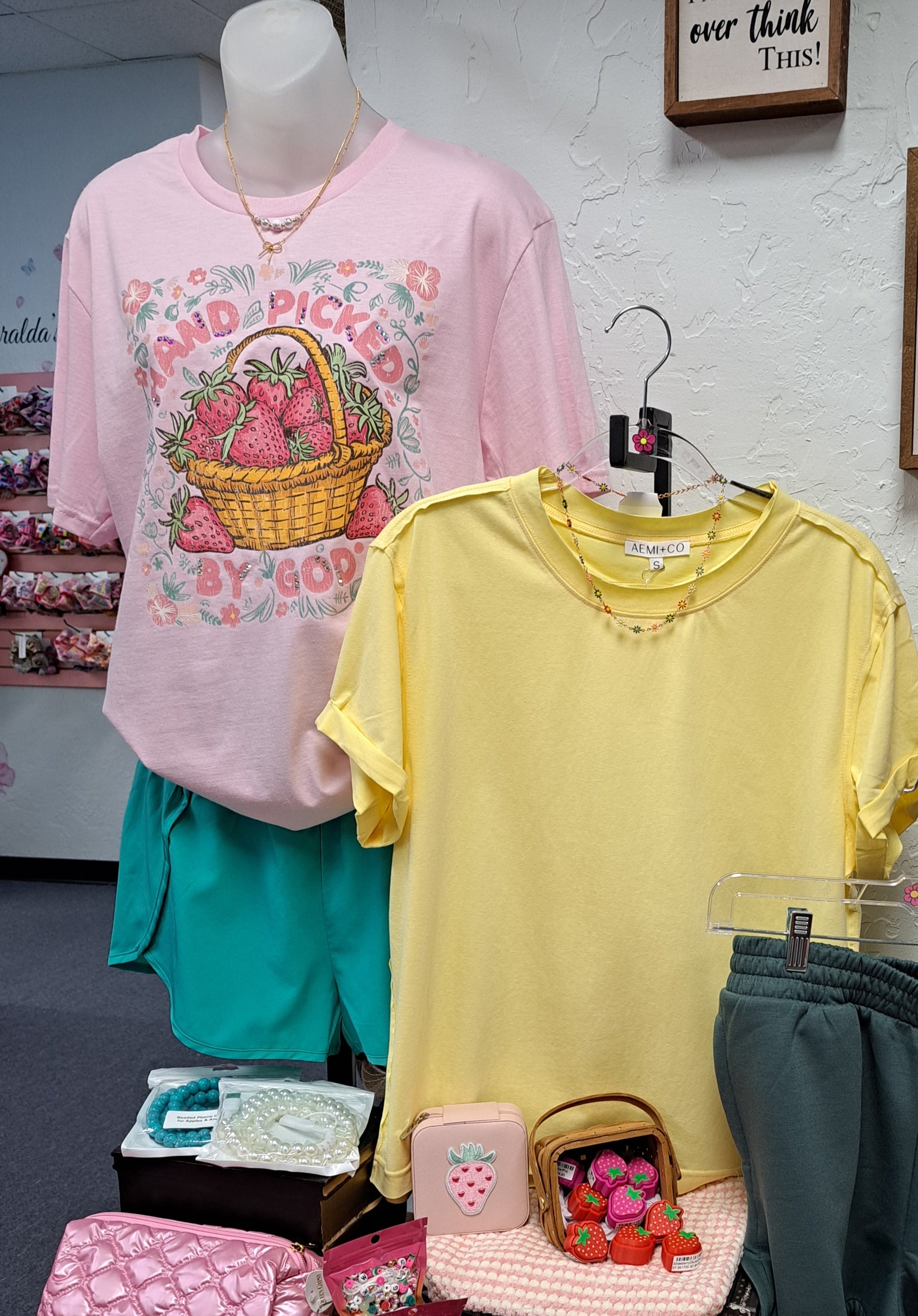 Strawberry and Yellow Top, Front. Display table at a store