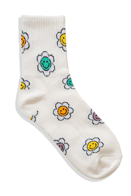 white crew socks with smiley face flower print throughout on white background