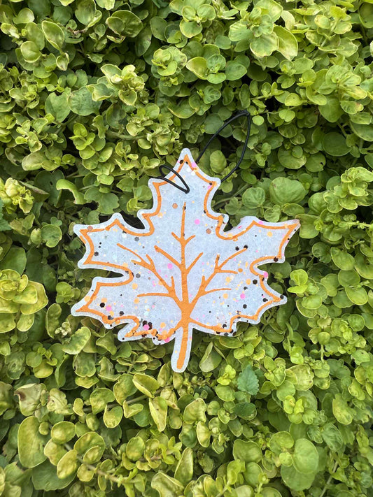 Decorative leaf-shaped freshie on a bed of green leaves