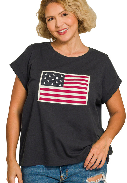Woman wearing a black t-shirt with an American flag design on a white background
