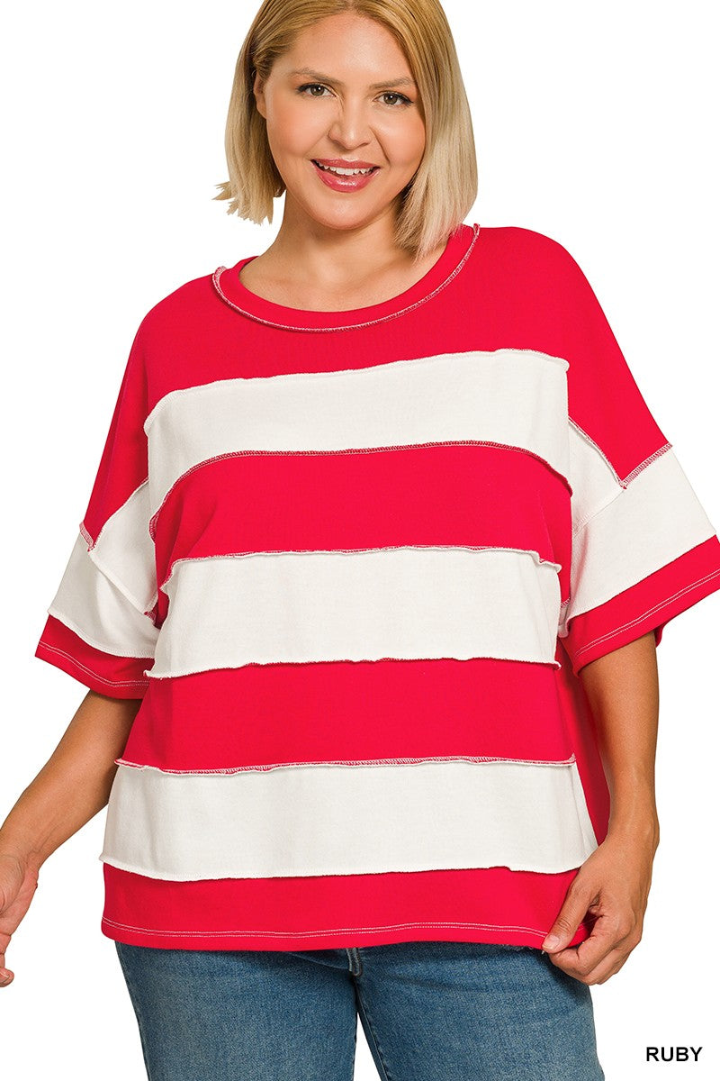 Woman wearing a red and white striped shirt on a white background