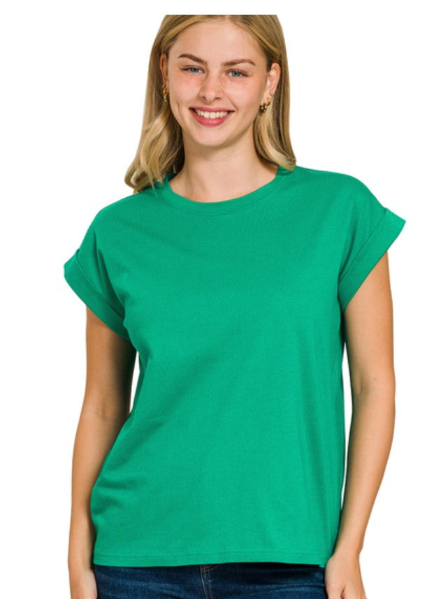 Woman wearing a green t-shirt on a white background