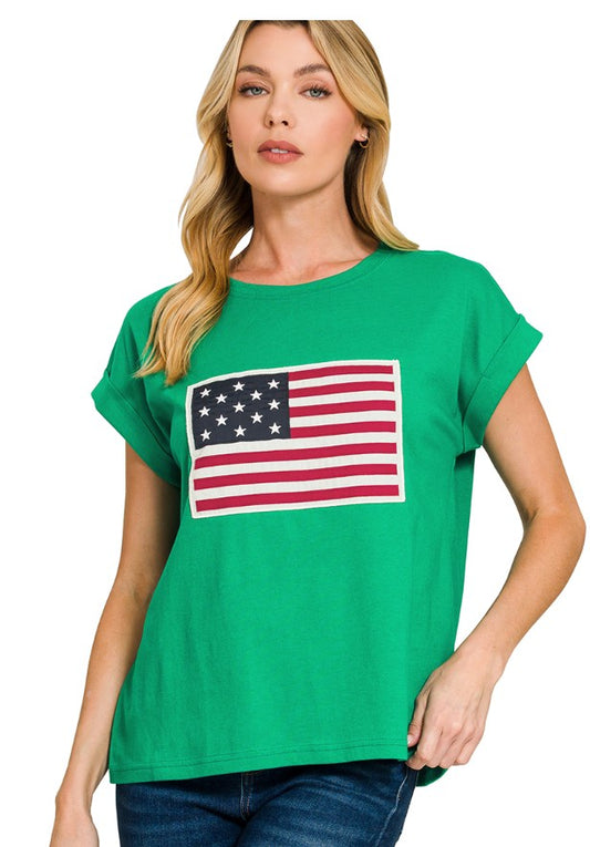 Woman wearing a green t-shirt with an American flag design on a white background