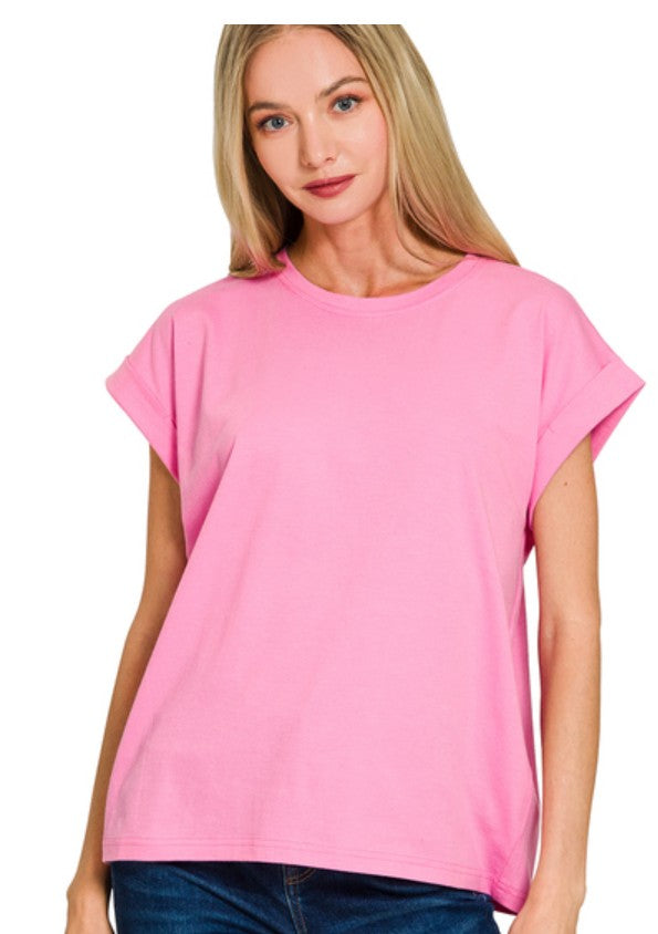 Woman wearing a pink t-shirt on a white background