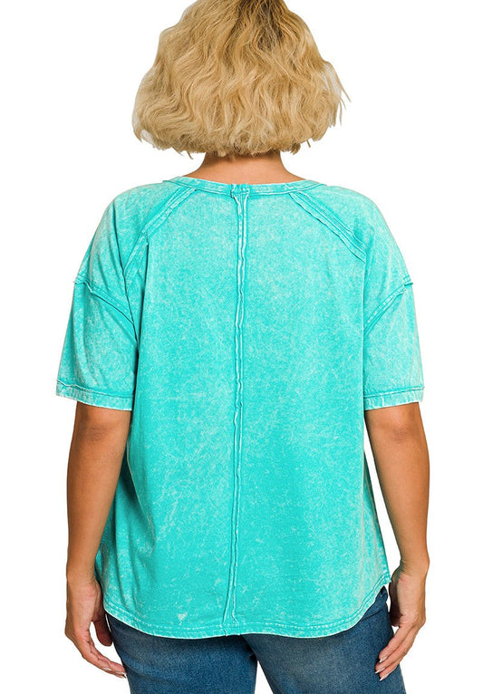Back view of woman wearing a turquoise t-shirt on a white background
